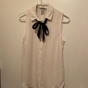 Women’s white dress shirt with black bow in front